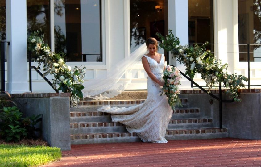 Bride Walking Down Stone Steps