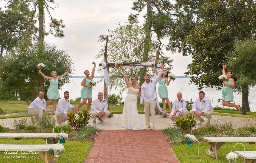 Bride, Groom, and Wedding Party at Outdoor Altar