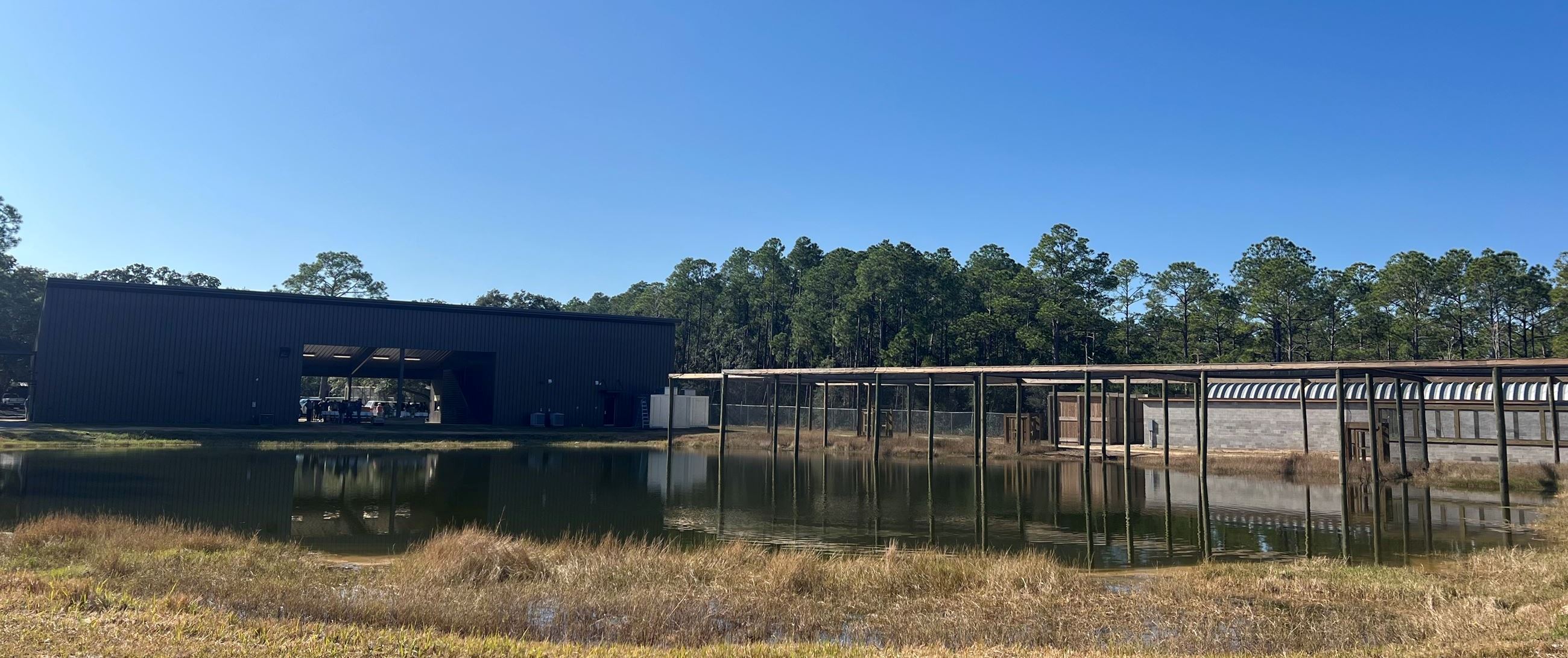 Orange Beach Wildlife Center facility by a pond