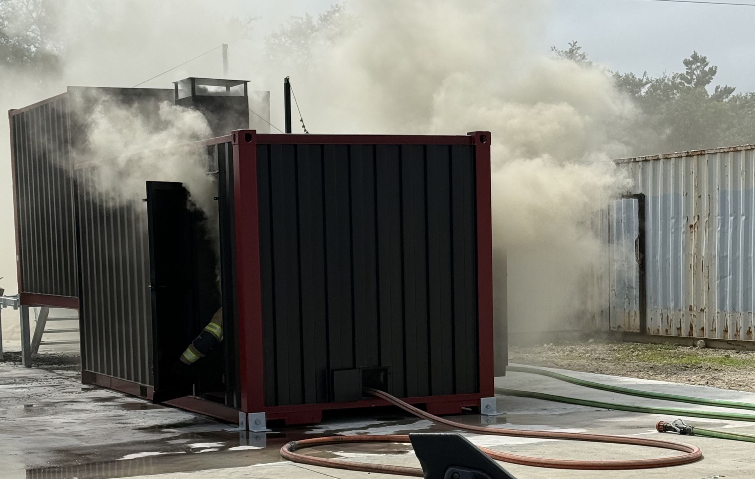 Flashover Simulator training with smoke shown